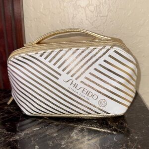 Shiseido White and Gold Striped Cosmetic Bag
